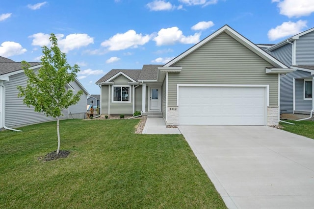 4412 NW 12th St, Ankeny, IA 50023 - view of front facade with a garage, driveway, and a front lawn