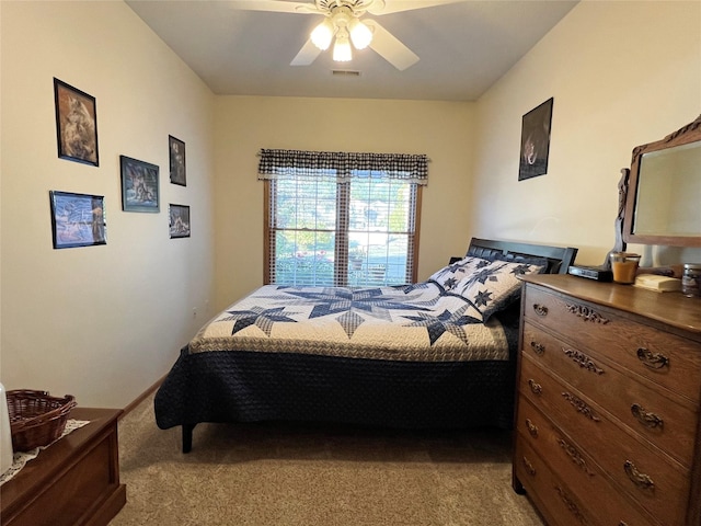8 Chancery Ct, Newton, IA 50208 - bedroom featuring light colored carpet and a ceiling fan