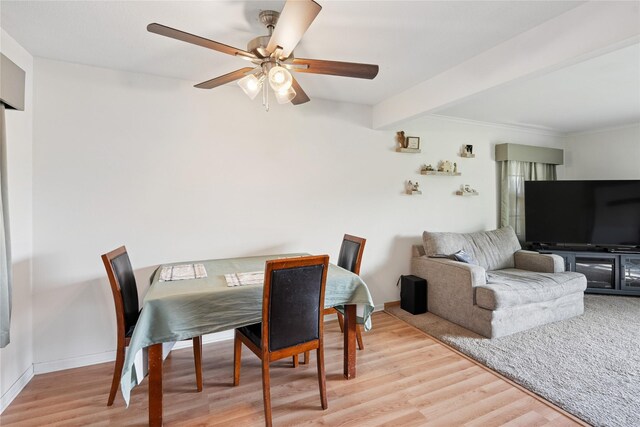 106 NW Scott St, Ankeny, IA 50023 - dining space with a ceiling fan, light wood-style floors, and beamed ceiling