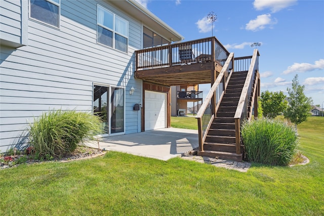 1609 NW Prairie Creek Dr, Grimes, IA 50111 - rear view of property featuring stairs, a lawn, a deck, and an attached garage