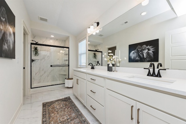4774 172nd Way, Urbandale, IA 50323 - full bathroom with marble look tile flooring, a marble finish shower, double vanity, lofted ceiling, and recessed lighting