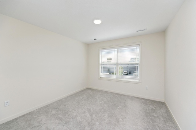 4774 172nd Way, Urbandale, IA 50323 - spare room with light colored carpet and baseboards