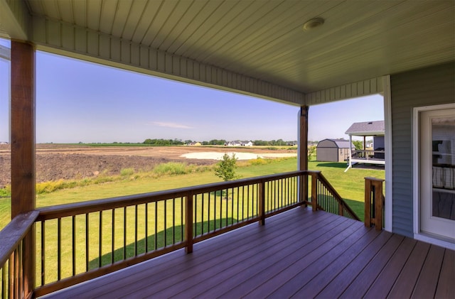4774 172nd Way, Urbandale, IA 50323 - wooden deck featuring a shed and a lawn