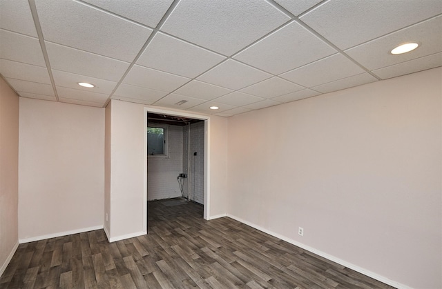 1802 W 5th Ave, Indianola, IA 50125 - empty room featuring dark wood-style floors, recessed lighting, and a paneled ceiling