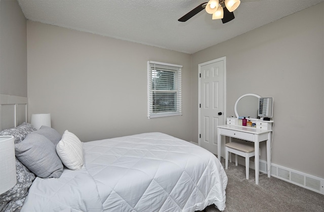 1802 W 5th Ave, Indianola, IA 50125 - carpeted bedroom featuring ceiling fan
