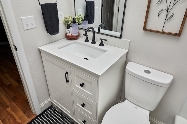 1802 W 5th Ave, Indianola, IA 50125 - bathroom with vanity and wood finished floors