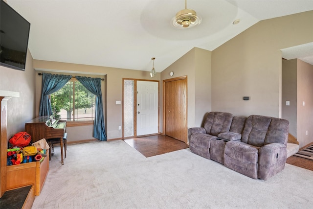 5428 NW 90th St, Johnston, IA 50131 - carpeted living area with vaulted ceiling and baseboards