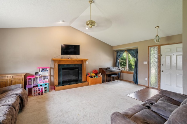 5428 NW 90th St, Johnston, IA 50131 - living room with lofted ceiling, a ceiling fan, carpet, and a fireplace