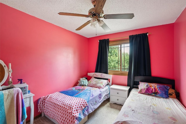 5428 NW 90th St, Johnston, IA 50131 - carpeted bedroom featuring a textured ceiling and a ceiling fan