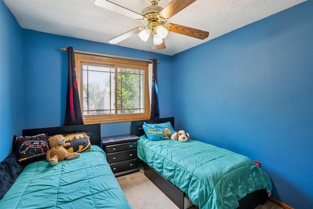 5428 NW 90th St, Johnston, IA 50131 - bedroom with carpet flooring, a textured ceiling, and ceiling fan
