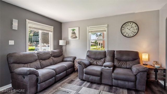 122 W Washington St, Colfax, IA 50054 - living area with wood finished floors and healthy amount of natural light
