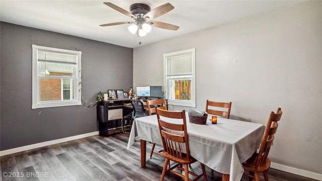 122 W Washington St, Colfax, IA 50054 - dining room with wood finished floors, ceiling fan, and an office area