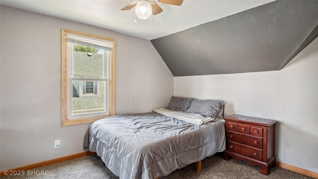 122 W Washington St, Colfax, IA 50054 - carpeted bedroom with lofted ceiling and ceiling fan