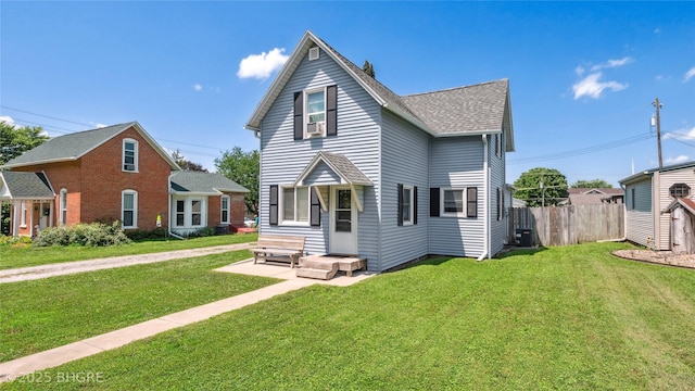 122 W Washington St, Colfax, IA 50054 - back of house with roof with shingles