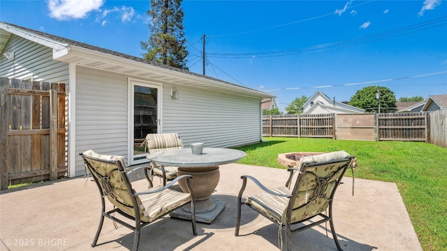 122 W Washington St, Colfax, IA 50054 - fenced backyard with a patio area