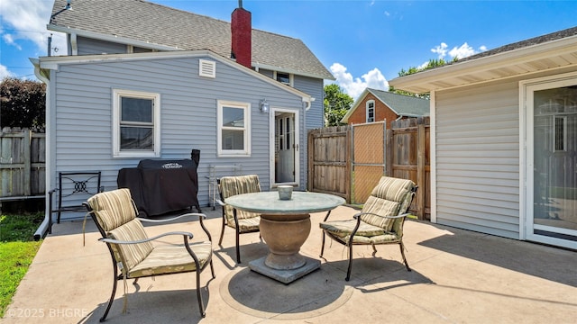 122 W Washington St, Colfax, IA 50054 - view of patio / terrace with grilling area and outdoor dining space