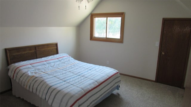 1401 N Grant St, Knoxville, IA 50138 - bedroom with vaulted ceiling and carpet