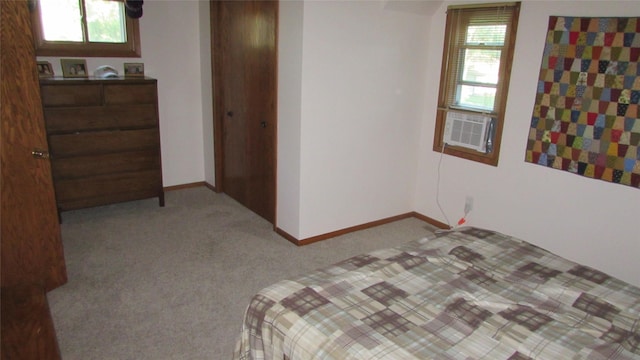 1401 N Grant St, Knoxville, IA 50138 - bedroom featuring carpet flooring, a closet, and cooling unit