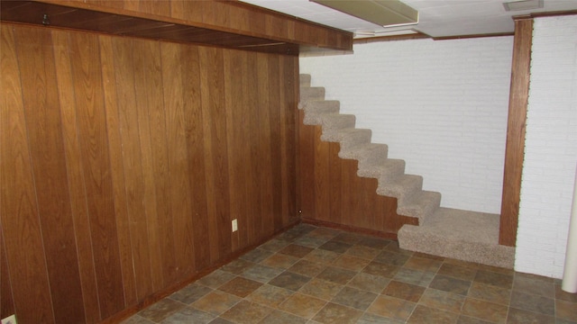 1401 N Grant St, Knoxville, IA 50138 - finished basement featuring wood walls and stairway