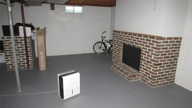 1401 N Grant St, Knoxville, IA 50138 - below grade area with a brick fireplace