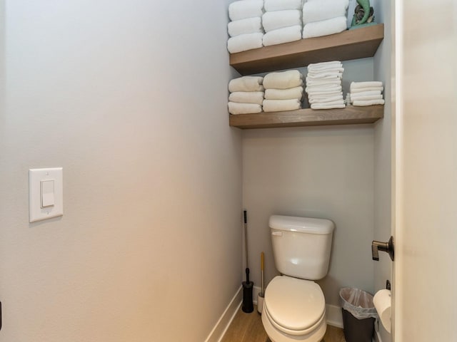 2013 Autumn Blaze Dr, Norwalk, IA 50211 - bathroom featuring baseboards and wood finished floors
