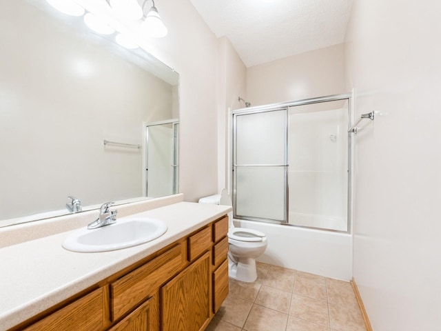 1106 N 6th St Unit 42, Indianola, IA 50125 - full bathroom featuring vanity, shower / bath combination with glass door, and tile patterned flooring