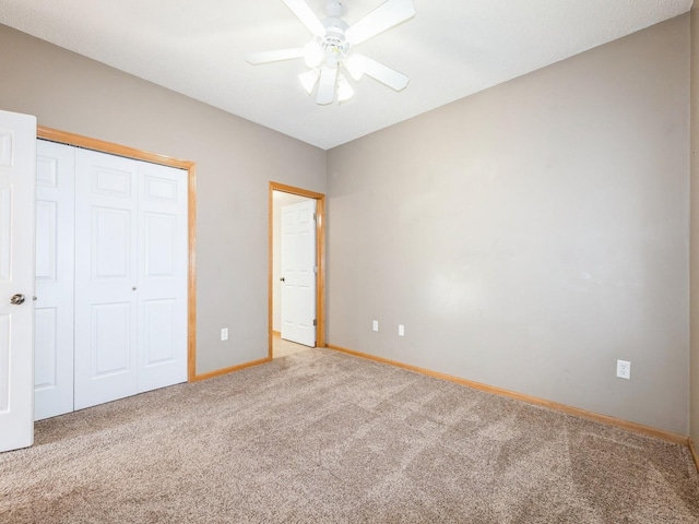 1106 N 6th St Unit 42, Indianola, IA 50125 - unfurnished bedroom with carpet floors, a closet, and ceiling fan