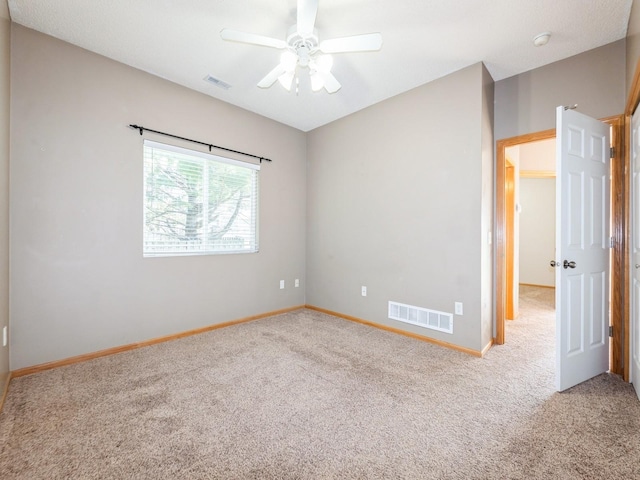 1106 N 6th St Unit 42, Indianola, IA 50125 - carpeted spare room featuring a ceiling fan and a smoke detector