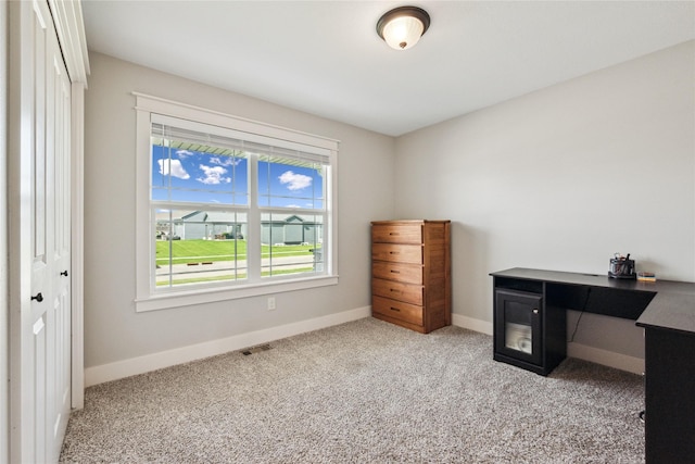629 Mallard Pointe Dr NW, Bondurant, IA 50035 - carpeted home office with baseboards