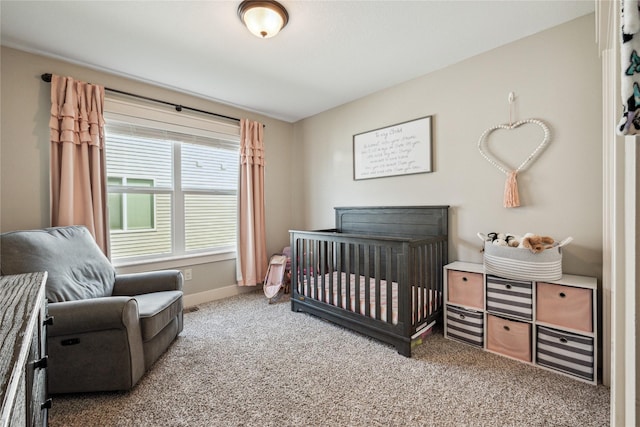629 Mallard Pointe Dr NW, Bondurant, IA 50035 - carpeted bedroom with a nursery area and baseboards