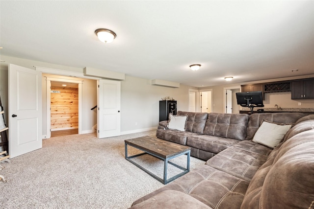 629 Mallard Pointe Dr NW, Bondurant, IA 50035 - living area with carpet and baseboards