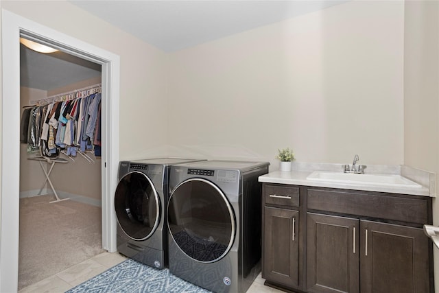 465 NW Gracewood Dr, Waukee, IA 50263 - washroom with washing machine and dryer, cabinet space, and light carpet