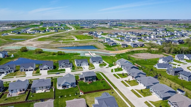 465 NW Gracewood Dr, Waukee, IA 50263 - aerial overview of property's location with a large body of water and nearby suburban area
