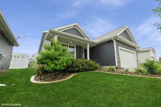 2401 E 50th St, Des Moines, IA 50317 - view of front of property with a garage