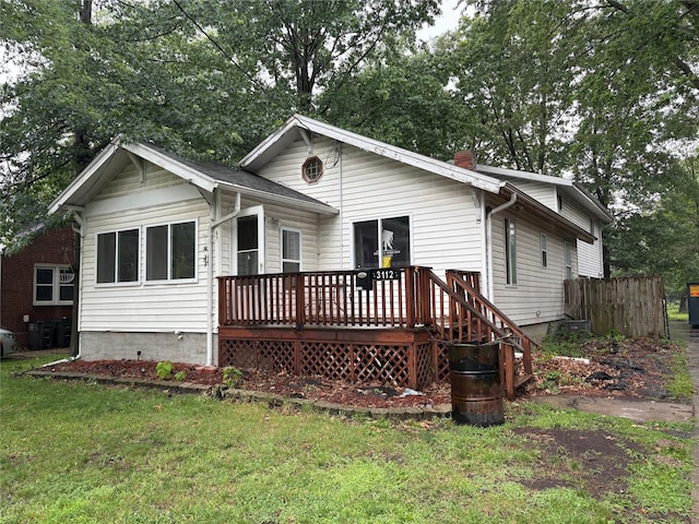 3112 52nd St, Des Moines, IA 50310 - view of front of house featuring a wooden deck and a chimney
