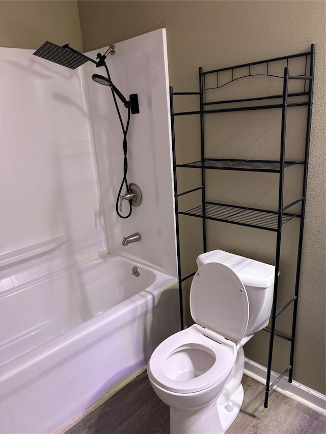 3112 52nd St, Des Moines, IA 50310 - full bathroom featuring wood finished floors and bathtub / shower combination