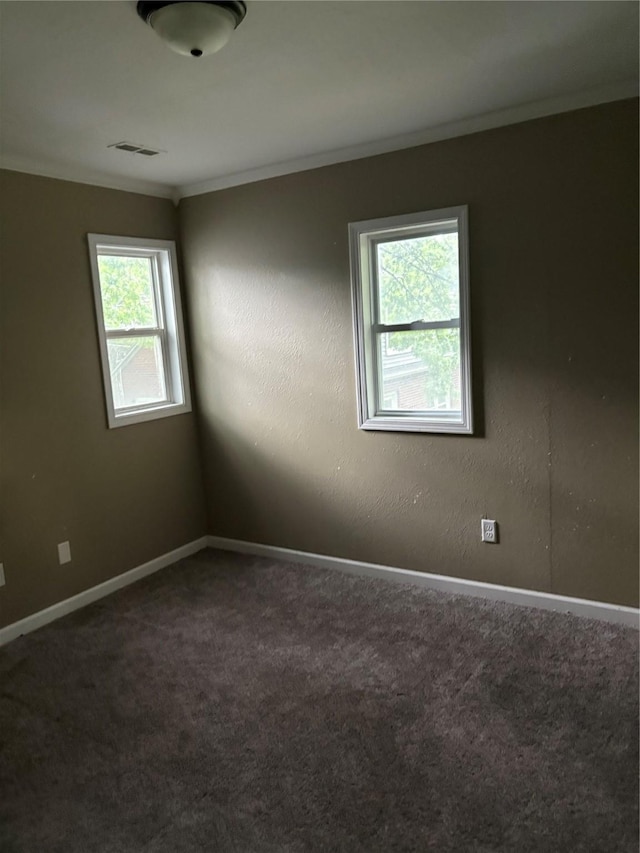 3112 52nd St, Des Moines, IA 50310 - carpeted empty room with crown molding and baseboards