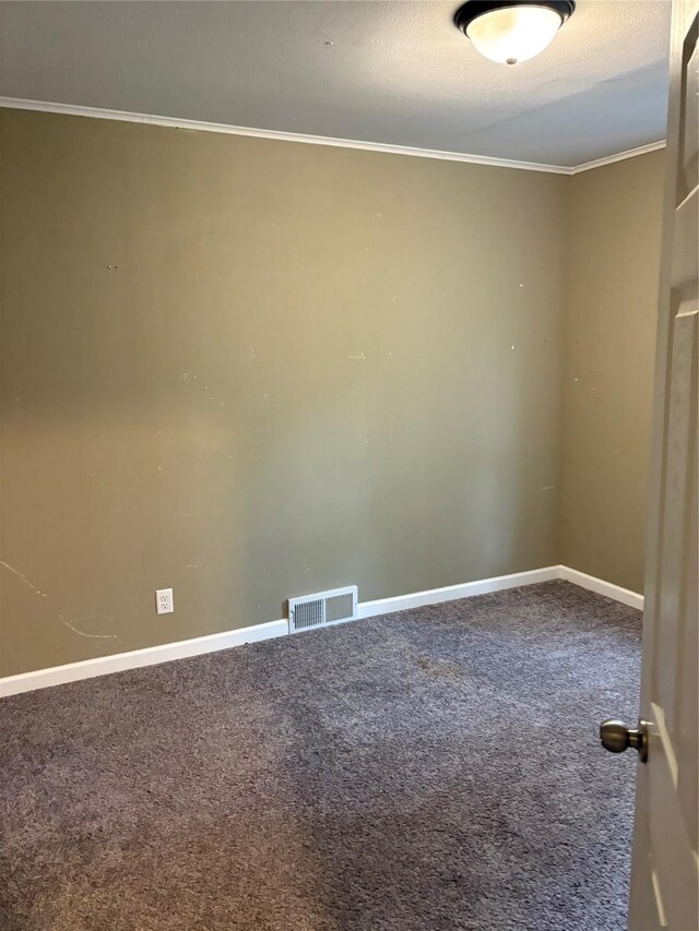 3112 52nd St, Des Moines, IA 50310 - carpeted spare room featuring ornamental molding