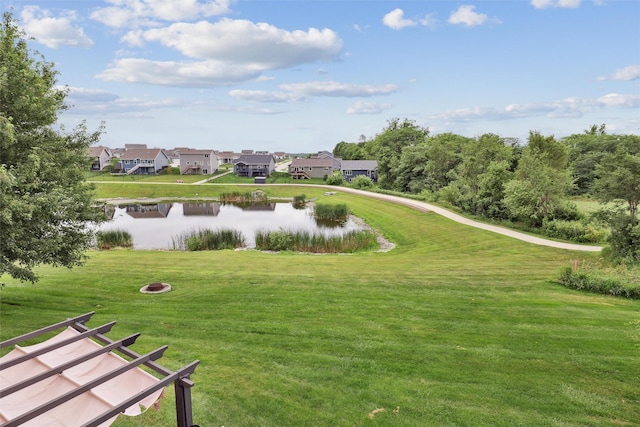 601 Orchard Hills Dr Unit 7006, Norwalk, IA 50211 - view of property's community featuring a water view, a lawn, and a residential view
