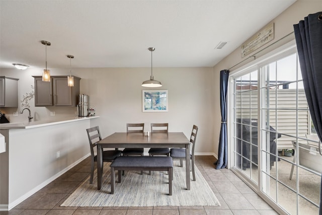 601 Orchard Hills Dr Unit 7006, Norwalk, IA 50211 - dining area featuring light tile patterned floors