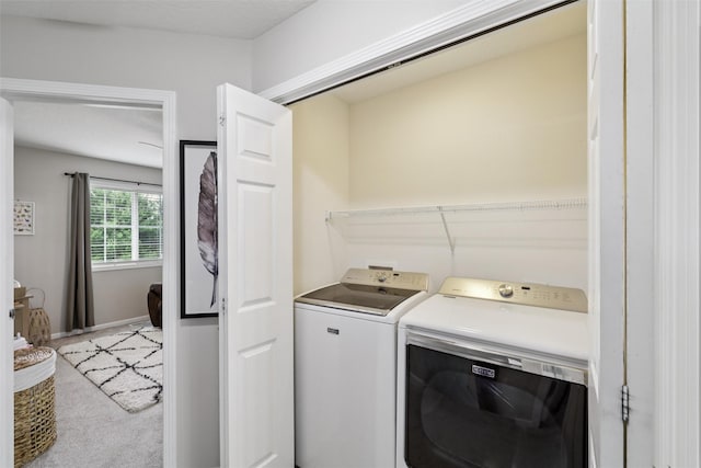601 Orchard Hills Dr Unit 7006, Norwalk, IA 50211 - washroom featuring washer and clothes dryer and baseboards