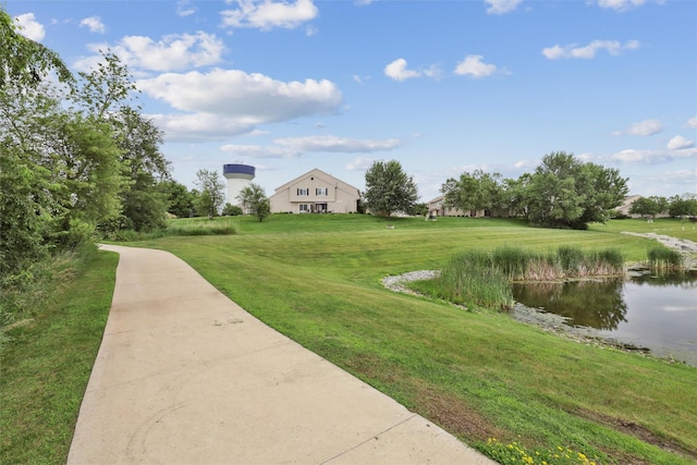 601 Orchard Hills Dr Unit 7006, Norwalk, IA 50211 - view of green lawn featuring a water view
