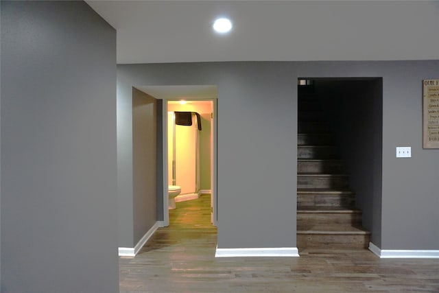 609 E Filmore St, Winterset, IA 50273 - stairway featuring wood finished floors and recessed lighting