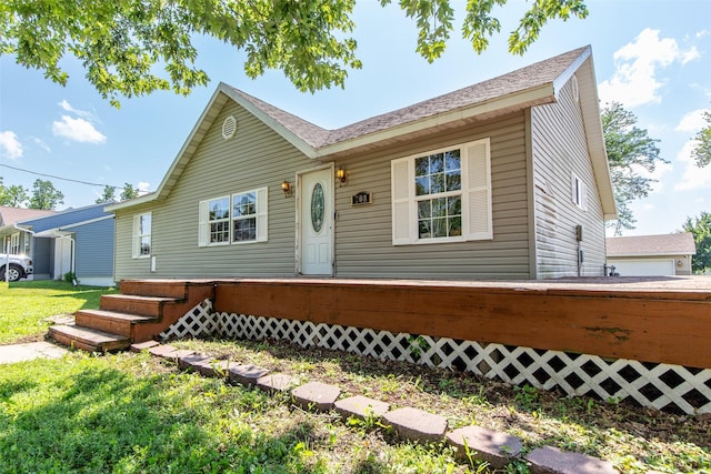 208 SW 4th St, Ogden, IA 50212 - ranch-style home featuring a front lawn
