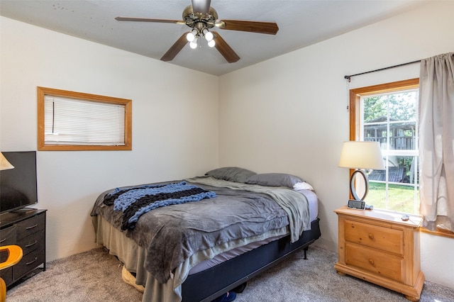 208 SW 4th St, Ogden, IA 50212 - bedroom featuring light carpet and ceiling fan