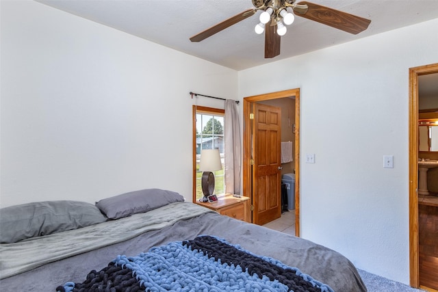 208 SW 4th St, Ogden, IA 50212 - tiled bedroom with a ceiling fan