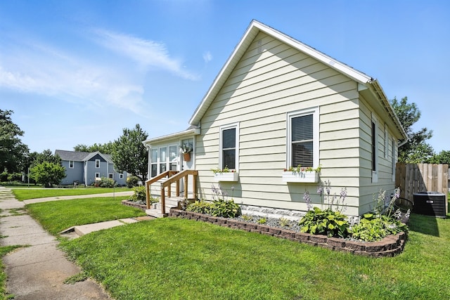 510 Maple Ave, Woodward, IA 50276 - view of side of home featuring a cooling unit and entry steps