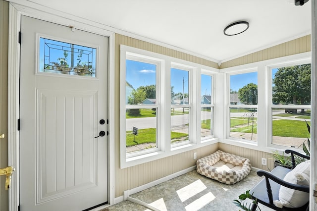 510 Maple Ave, Woodward, IA 50276 - sunroom featuring baseboards