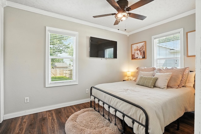 510 Maple Ave, Woodward, IA 50276 - bedroom featuring multiple windows, wood finished floors, crown molding, and a ceiling fan