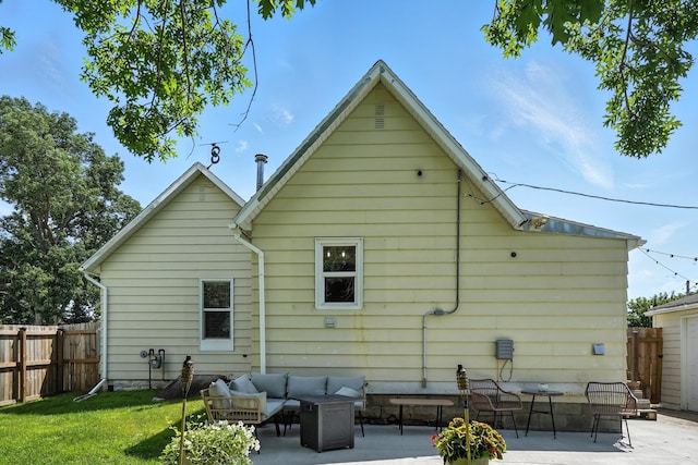 510 Maple Ave, Woodward, IA 50276 - rear view of property featuring a patio and outdoor lounge area